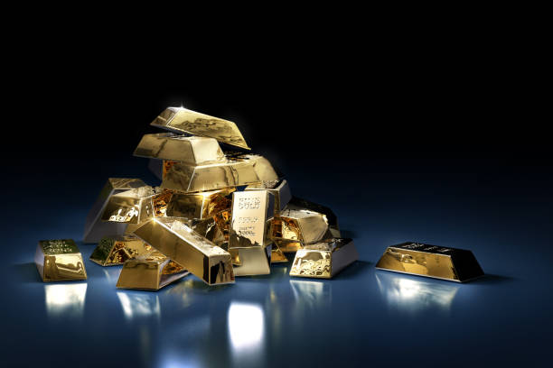 Pile of gold bars or ingots on a dark background Wealth concept with pile of gold bars or ingots on a dark background - 3D illustration ingot photos stock pictures, royalty-free photos & images