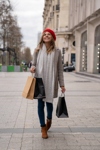 istock Happy woman shopping in Paris 1028983544