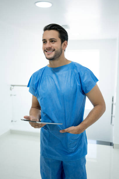 istock Doctor with a tablet in his hand 1028986274