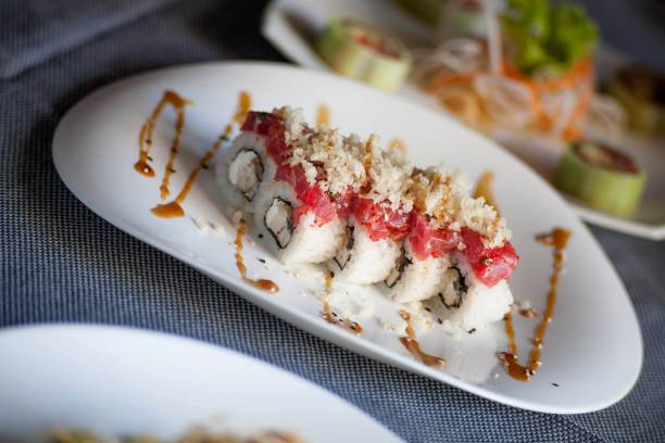 istock sushi with salmon, tuna rice. cheese tofu. 1028986516