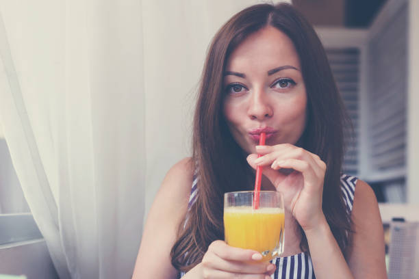 istock Lady enjoying delicious drink 1028989306
