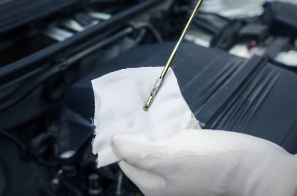 istock Car service. Oil level. 1028994004