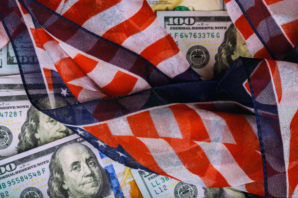 istock top view american flag on us dollars background 1029022686