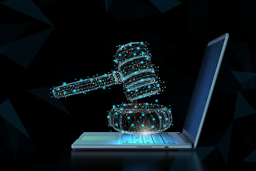 Internet law concept with 3d rendering computer notebook display gavel judge