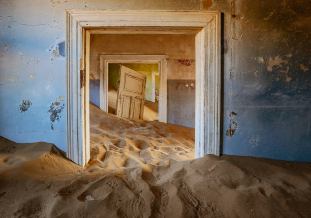 Sand has invaded and taken over these rooms in Kolmanskoppe Sand has invaded and taken over these rooms in Kolmanskoppe, Namibia kolmanskop namibia stock pictures, royalty-free photos & images