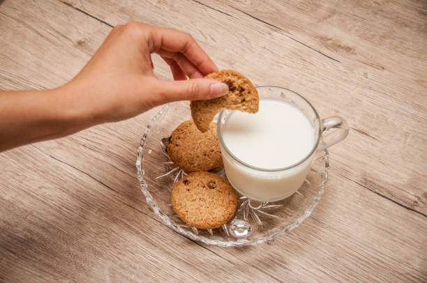 istock Cookies and milk - Cup with milk 1029041674