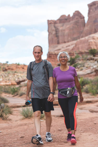 istock Senior couple hiking in the desert 1029041880