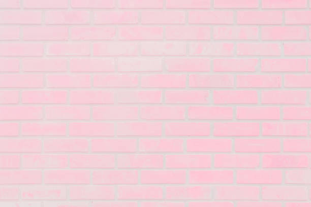 istock Pastel Pink and white brick wall texture background. Brickwork or stonework sweet flooring interior rock old pattern clean concrete grid uneven bricks design stack. 1029044762