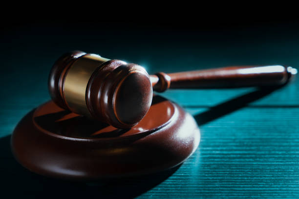 istock Judge hammer on a wooden background 1029077216