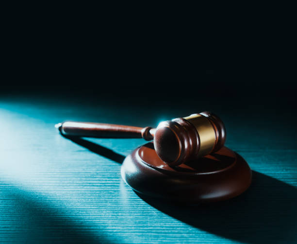 istock Judge hammer on a wooden background 1029077222