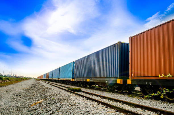 istock Container on train ,rail way on small stone is waiting for sent to seaport in blue sky is so beautiful sky this image for import and export logistic concept 1029084906