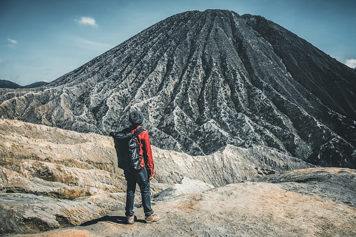 Traveler Men at crater volcano Mt.Bromo East Java,Indonesia