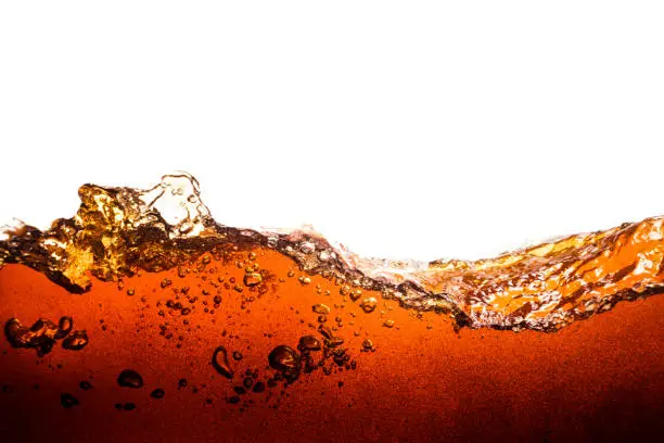 Photo of Background of refreshing cola flavored soda with bubbles