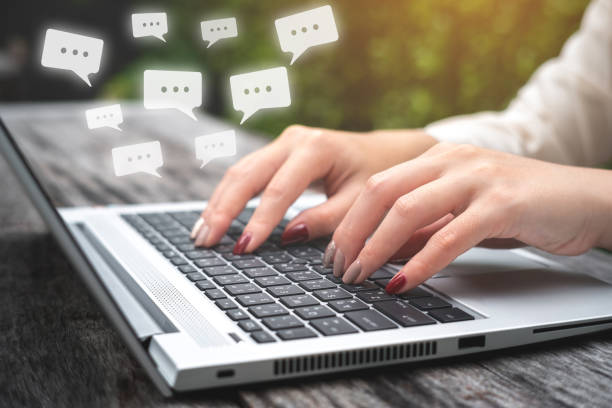 istock Business woman using Laptop pc to send e- mail with email icon, E-mail and communication concept. 1029101516