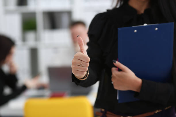 istock Female arm show OK or confirm during conference 1029109860