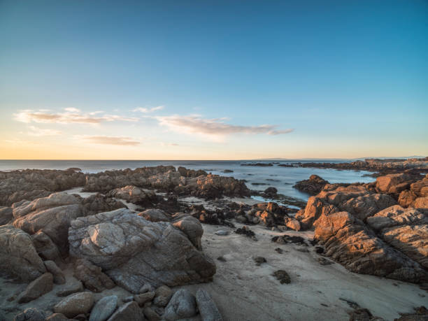 istock sunset over pacific ocean and carmel beach,California 1029116966
