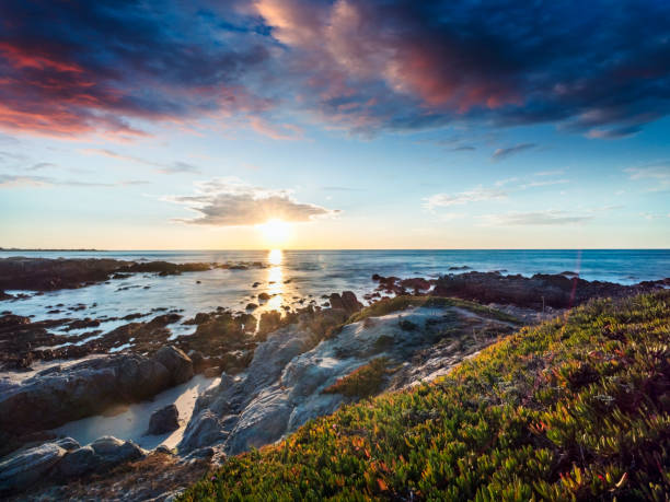 istock sunset over pacific ocean and carmel beach,California 1029117014