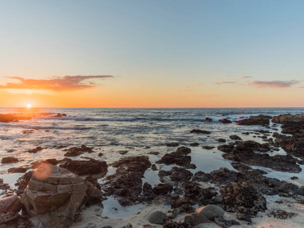 istock sunset over pacific ocean and carmel beach,California 1029117038