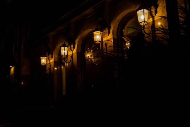 istock Old lanterns on a wall of the house 1029122078