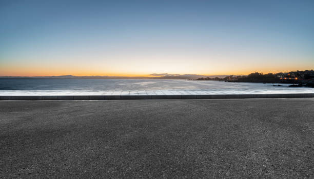 istock empty coastal highway against sea and sky 1029124664