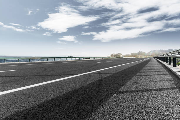istock tarmac road at coast 1029130666