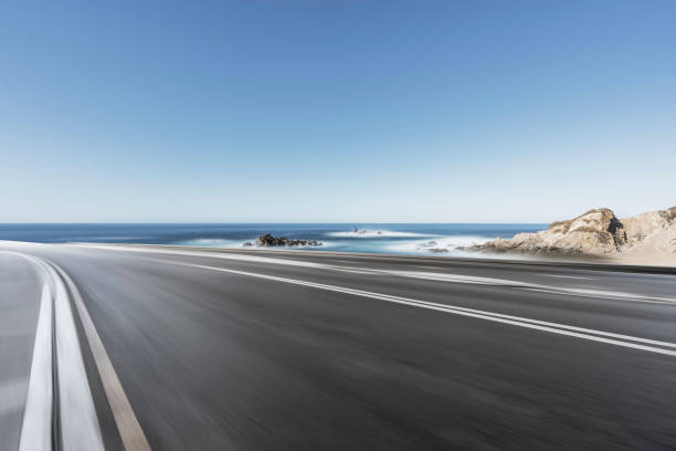 istock blurred motion coastal road against sky 1029131318