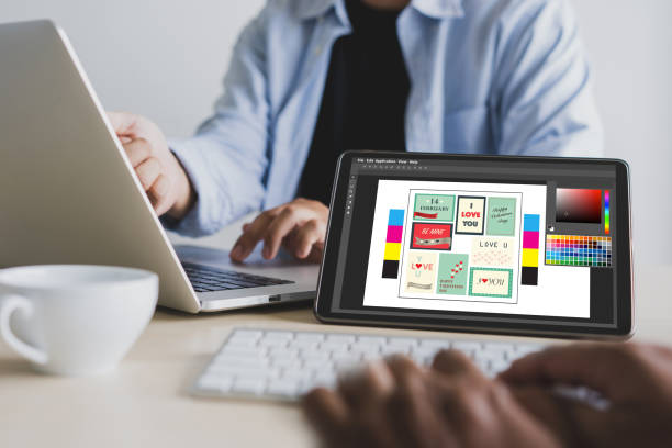 istock Creative Designer Graphic at work. Color swatch samples, Illustrator Graphic designer working digital tablet and computer 1029141498
