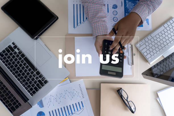 istock join us concept Businessman working at office JOIN OUR TEAM 1029141576