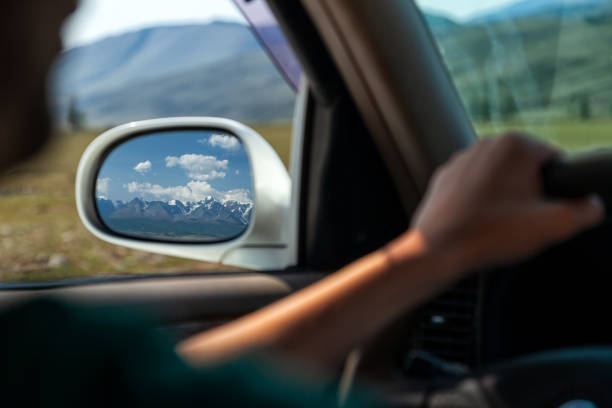 istock driving car on the mountain road. 1029155312