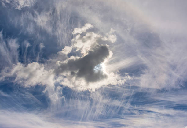 istock Fantastic figures formed by clouds in the summer sky. 1029161364