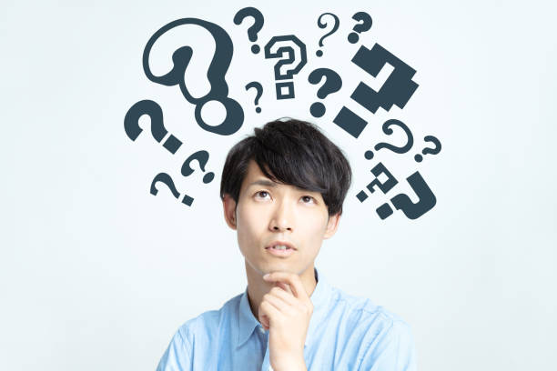 istock Young asian man having questions. 1029166706