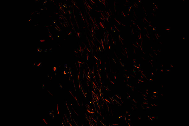 istock bonfire spark in the dark sky in night, shallow focus 1029167228