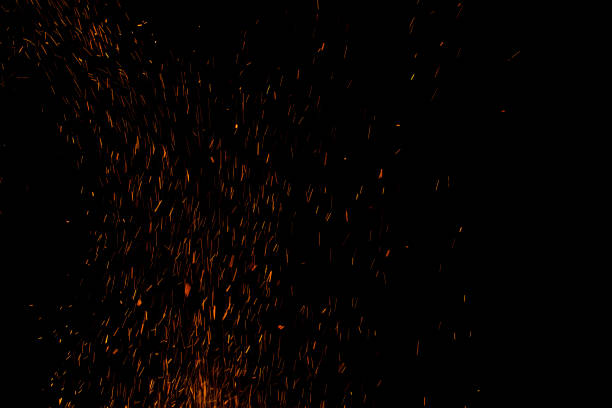 istock bonfire spark in the dark sky in night, shallow focus 1029167230