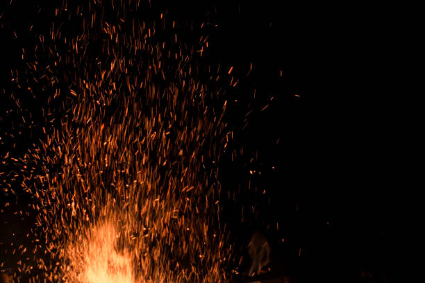 istock bonfire spark in the dark sky in night, shallow focus 1029167250