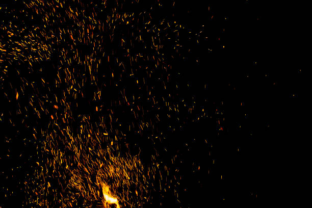 istock bonfire spark in the dark sky in night, shallow focus 1029167264