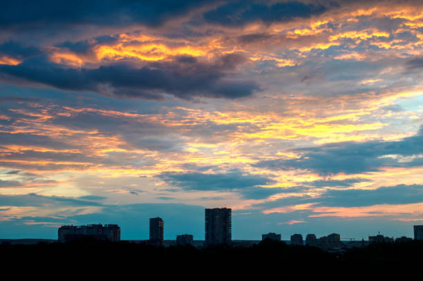 beautiful sunset over the city. In blue and orange colours stock photo