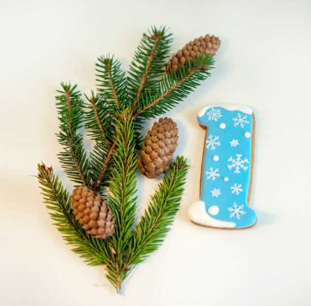 decorated christmas gingerbread and green fir branches stock photo