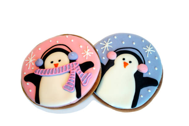 two New Year gingerbread decorated with glaze stock photo