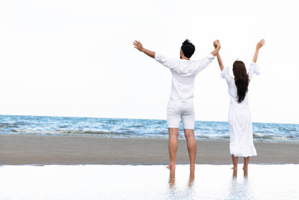 istock Couple going honeymoon on tropical beach in summer 1029172768