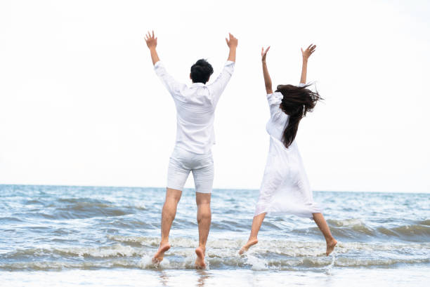istock Couple going honeymoon on tropical beach in summer 1029172792