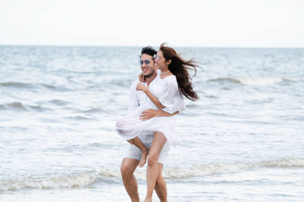 istock Couple going honeymoon on tropical beach in summer 1029172840