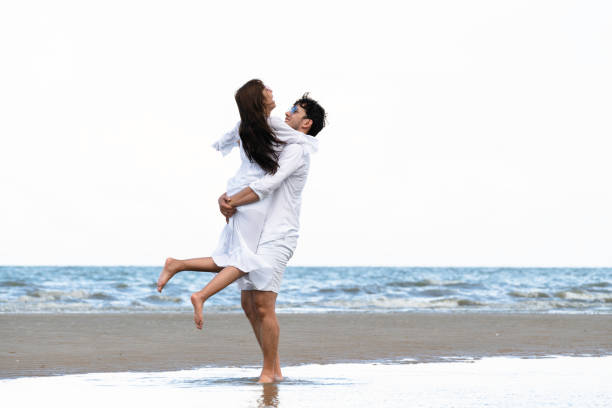 istock Couple going honeymoon on tropical beach in summer 1029172846