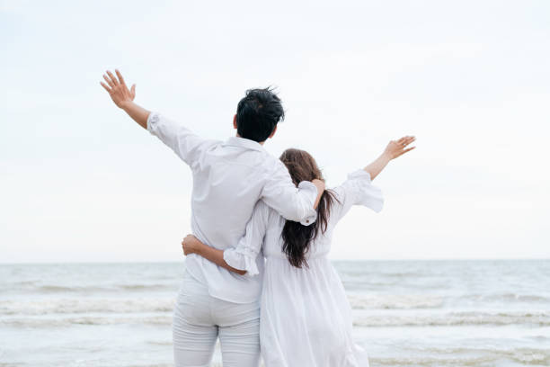 istock Couple going honeymoon on tropical beach in summer 1029172916