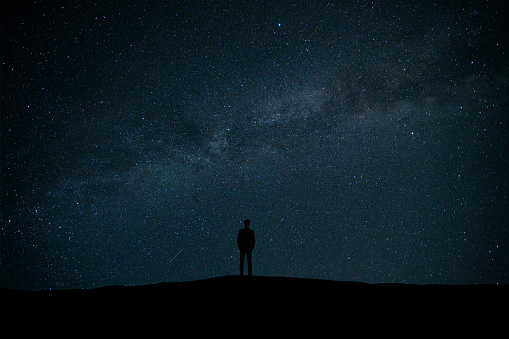 The man standing on the background of stars