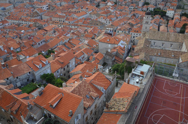 old city of dubrovnik has managed to preserve its gothic, renaissance and baroque churches, monasteries, fortress & fountains. red rooftops are the iconic look of the old city. - warrior eastern europe croatia architecture imagens e fotografias de stock