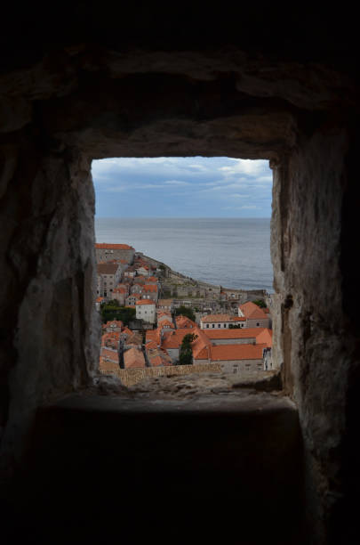 old city of dubrovnik has managed to preserve its gothic, renaissance and baroque churches, monasteries, fortress & fountains. red rooftops are the iconic look of the old city. - warrior eastern europe croatia architecture imagens e fotografias de stock