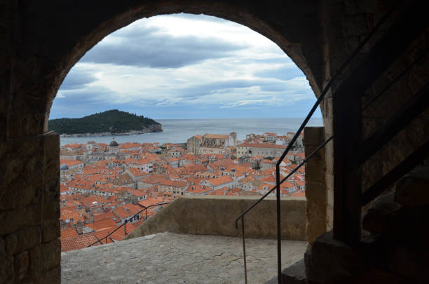 old city of dubrovnik has managed to preserve its gothic, renaissance and baroque churches, monasteries, fortress & fountains. red rooftops are the iconic look of the old city. - warrior eastern europe croatia architecture imagens e fotografias de stock