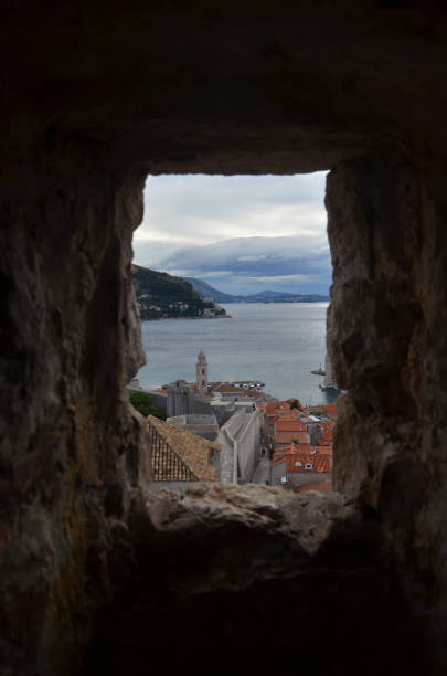 old city of dubrovnik has managed to preserve its gothic, renaissance and baroque churches, monasteries, fortress & fountains. red rooftops are the iconic look of the old city. - warrior eastern europe croatia architecture imagens e fotografias de stock