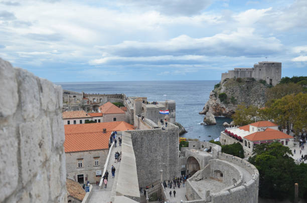 old city of dubrovnik has managed to preserve its gothic, renaissance and baroque churches, monasteries, fortress & fountains. red rooftops are the iconic look of the old city. - warrior eastern europe croatia architecture imagens e fotografias de stock