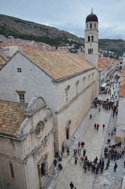 old city of dubrovnik has managed to preserve its gothic, renaissance and baroque churches, monasteries, fortress & fountains. red rooftops are the iconic look of the old city. - warrior eastern europe croatia architecture imagens e fotografias de stock